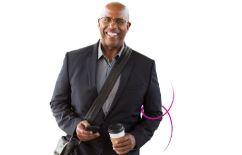 Man standing with coffee cup and cell phone